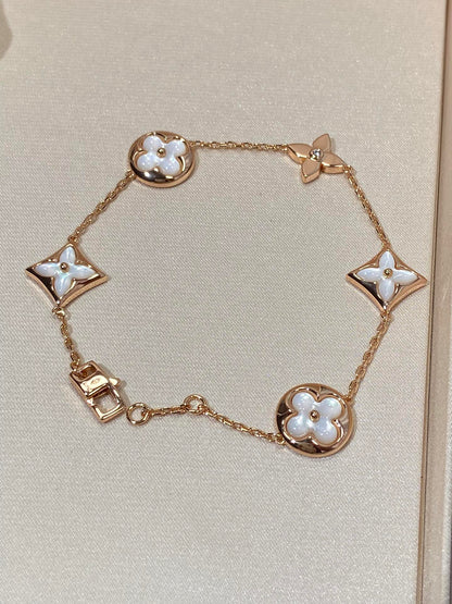 [moco jewelrys]STAR AND SUN 5 MOTIF MOP PINK GOLD BRACELET